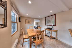 Dining area featuring a baseboard heating unit