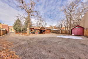 View of yard with a shed