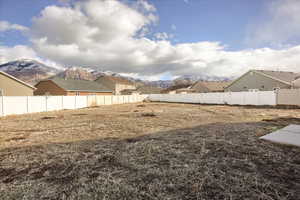 View of backyard featuring a mountain view