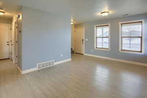 Living room featuring light hardwood / wood-style floors