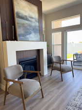 Sitting room featuring light hardwood / wood-style flooring