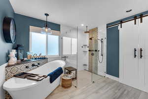 Bathroom with shower with separate bathtub