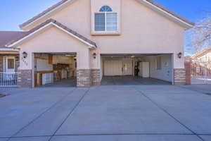 Rear view of house with a garage