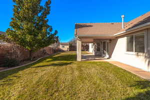 View of yard with a patio