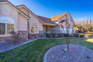 View of front of property featuring a front yard and a porch