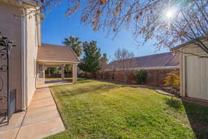 View of yard with a patio