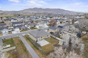 Birds eye view of property with a mountain view