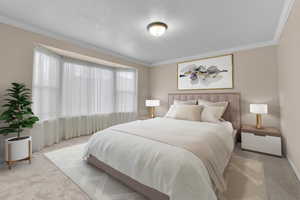 Master bedroom with bay window.  Carpeted bedroom with a textured ceiling, multiple windows, and crown molding