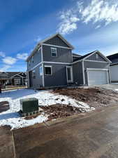 View of front of house featuring a garage