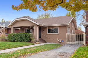 View of front of house with a front lawn