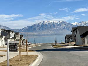 View of road with a water and mountain view