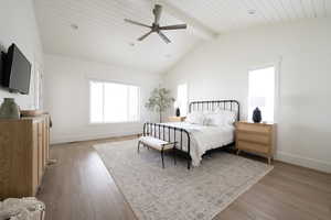 MASTER Bedroom featuring vaulted ceiling with beams, light wood-type flooring, and ceiling fan