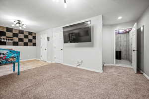 Recreation room featuring carpet flooring