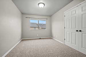 View of carpeted spare room