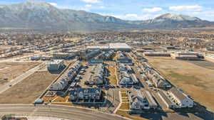 Birds eye view of property with a mountain view