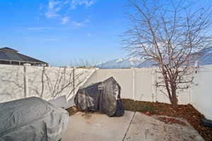 View of patio / terrace featuring a mountain view