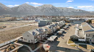 Birds eye view of property with a mountain view