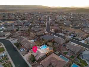 Birds eye view of property with a mountain view