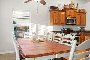 Dining room featuring ceiling fan