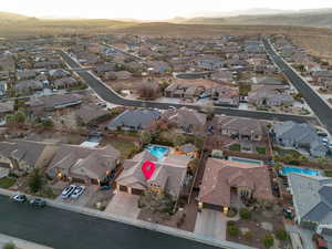 Birds eye view of property featuring a mountain view