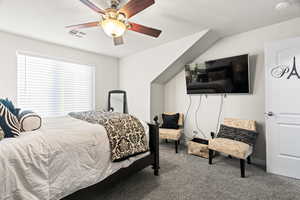 Bedroom featuring carpet and ceiling fan