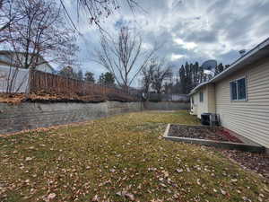 View of yard featuring central AC unit