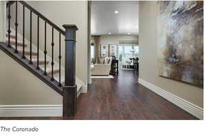 Interior space with dark hardwood / wood-style floors