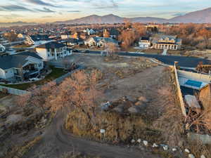 Aerial view at dusk featuring a mountain view