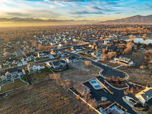 Aerial view at dusk featuring a mountain view