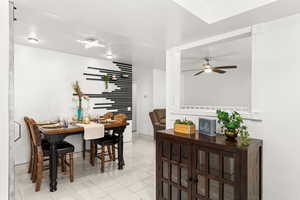 Dining space with ceiling fan