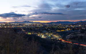 Aerial view at dusk featuring a mountain view