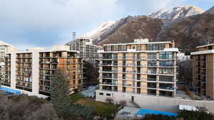 View of building exterior featuring a mountain view