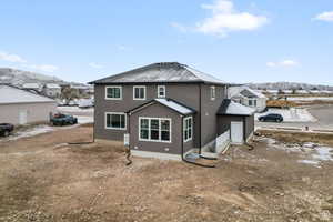 Rear view of house with a mountain view