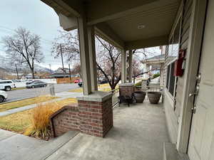 View of patio featuring a porch