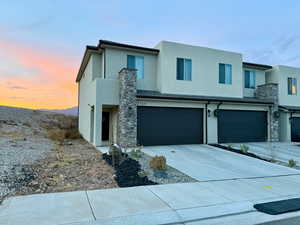 Contemporary house featuring a garage