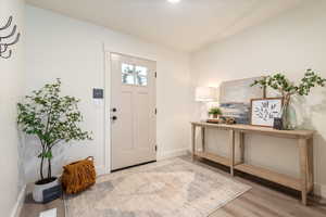 Foyer featuring hardwood / wood-style floors