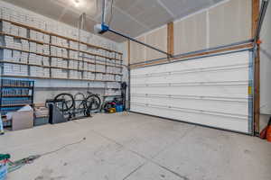 Garage featuring a garage door opener