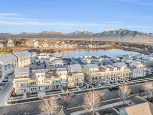 Aerial view featuring a water and mountain view