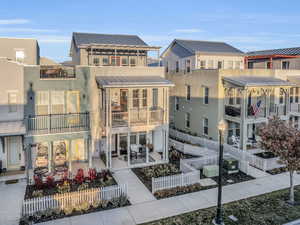 Rear view of house with a balcony