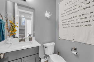 Bathroom with vanity and toilet