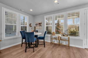 Dining area featuring light wood-type flooring