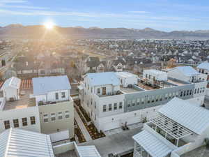 Birds eye view of property with a mountain view