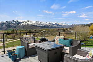 View of patio featuring a mountain view and an outdoor living space