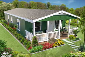 View of front of home featuring a front yard and a porch