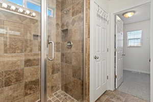 Bathroom featuring an enclosed shower