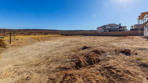 View of yard with a rural view