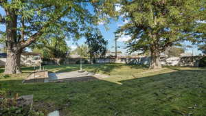 View of yard with a patio area