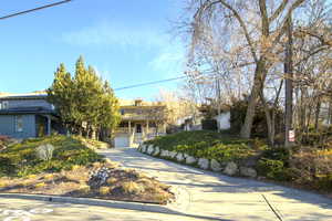 View of front of property with a garage