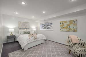 Basement bedroom with carpet