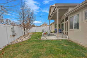 View of yard with a patio area